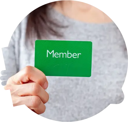 A young caucasian woman is holding a green card that says member on it. A customizable image which has space for text to be inserted. Being a member, membership dues, subscription, group concepts.